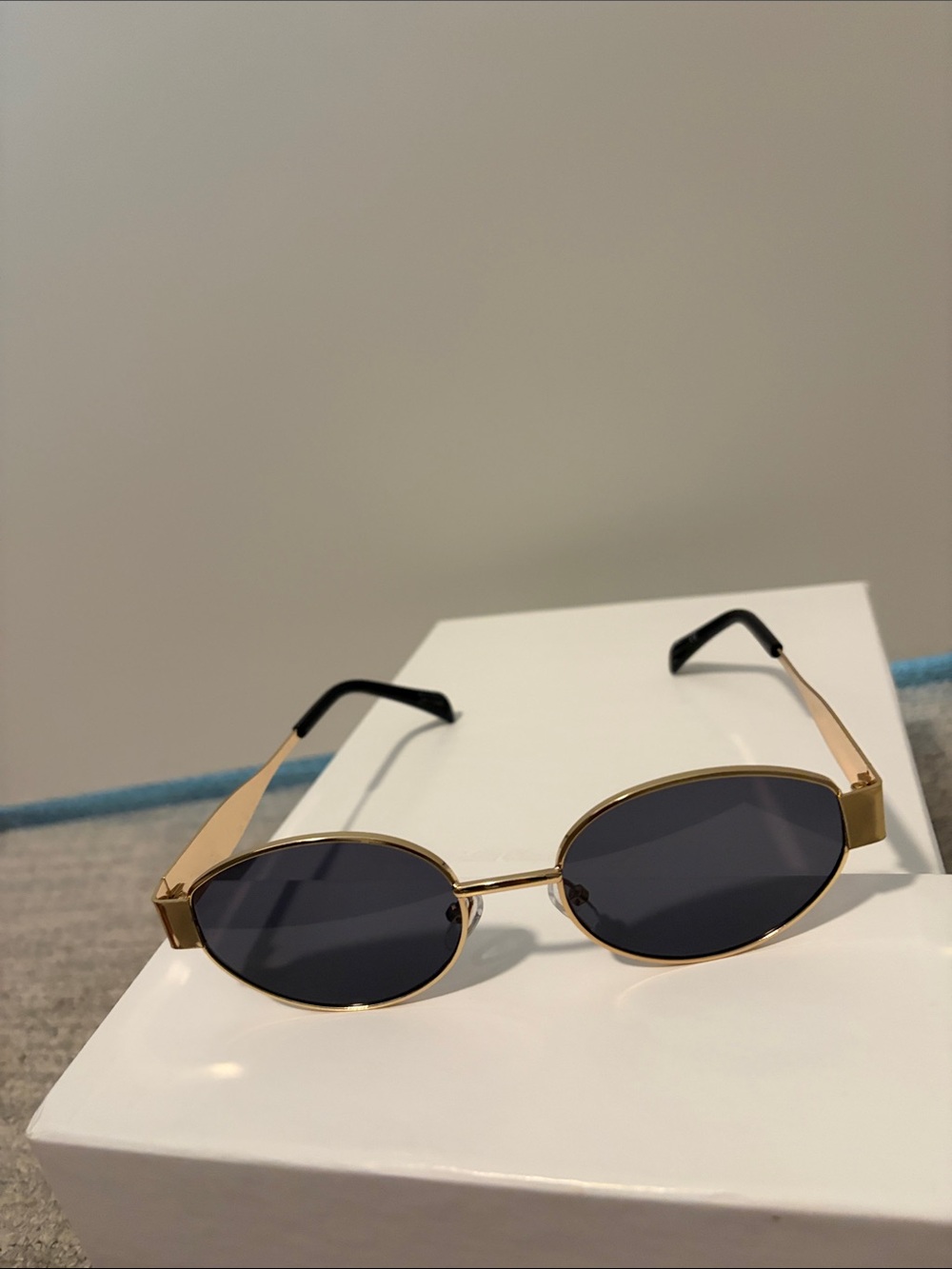 Amazon Gold Frame Black Lens Oval Sunglasses for Women